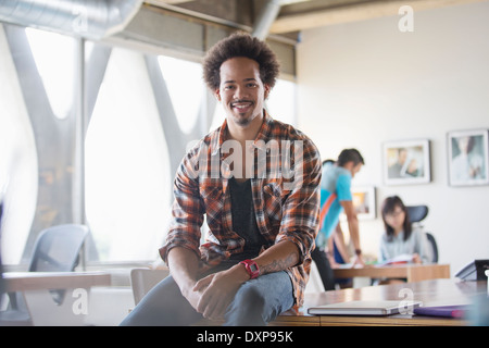Portrait of confident casual businessman in office Stock Photo