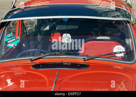 A VW Beetle fitted with a sun visor at Santa Pod racetrack ...