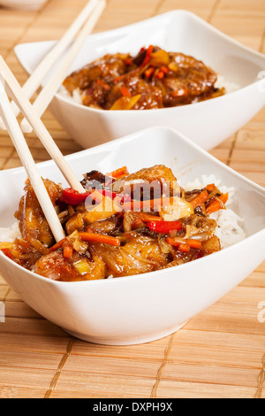 Sweet and sour pork and rice in a bowl Stock Photo