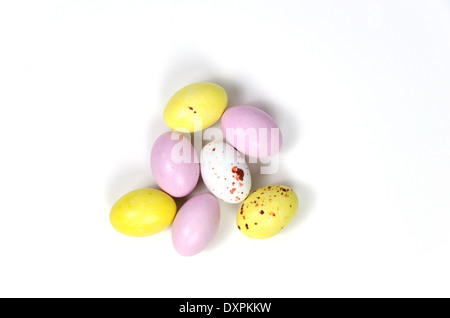 Multi coloured easter eggs confection at white background Stock Photo