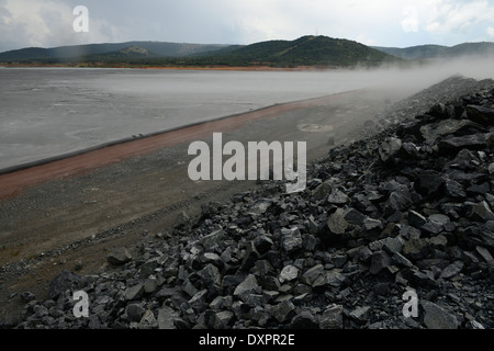 TANZANIA Geita Gold Mine, open-cast gold mine of company AngloGold Ashanti, sewage pond for toxic effluents from gold ore processing containing chemicals like, cyanide process or the MacArthur-Forrest process Stock Photo