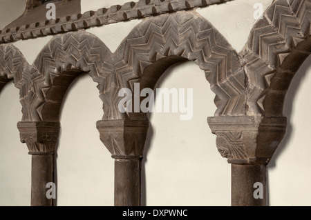 Norman arcading in the chancel of All Saints Church, Earls Barton, Northamptonshire, England, UK Stock Photo