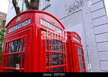 Red London public telephone boxes in Brighton city centre Stock Photo