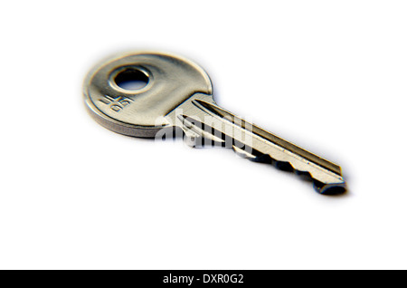Regular silver key isolated on white background Stock Photo