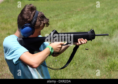 Du Bois, United States, boy aiming with a gun Stock Photo