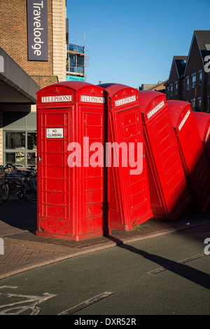 Tumbling Telephone Boxes, Sculpture 'Out of Order' by David Mach, Old London Road, Kingston, London, UK Stock Photo
