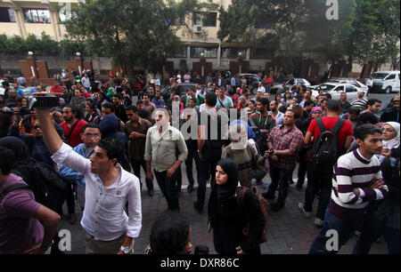 Cairo, Egypt. 29th Mar, 2014. Egyptian journalists take part in a protest the death of the Egyptian journalist Mayada Ashraf, outside the Egyptian Journalist Syndicate in Cairo, on March 29, 2014. Al-Dustour, a privately-owned newspaper, said on its website that its journalist Mayada was killed while covering clashes in the northern Cairo neighbourhood of Ein Shams Credit:  Mohammed Bendari/APA Images/ZUMAPRESS.com/Alamy Live News Stock Photo