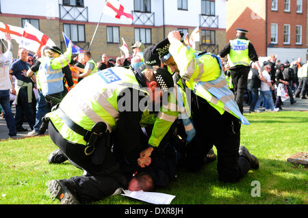 Peterborough, Cambridgeshire, UK. 29th March 2014.Members of the EDL marched through Peterborough this afternoon ,A crowd of around three hundred took part starting at the peacock public house on London Road.They marched in to the city center were speeches where made ,One man was arrested on suspicion public order offence.  A counter march also took place early in the day by Peterborough Trade Union Council. Credit:  Ian Francis/Alamy Live News Stock Photo