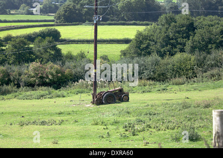 Abandoned and rusting tractor on a farm River Teme Valley near Knighton  from The Offa's Dyke Path Shropshire England Stock Photo