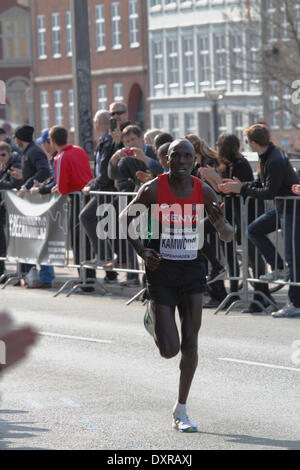 Copenhagen, Denmark, 29th March, 2014. The runners in the IAAF/AL-Bank World Half Marathon Championships 2014 ran in the streets of sunny Copenhagen with start and goal at the Christiansborg Palace Square. The elite women and men were followed by nearly 30,000 recreational and sub-elite runners. Geoffrey Kipsang Kamworor from Kenya on the homestretch wins shortly after the men's class in 59.07. Samuel Tsegay from Eritrea 2nd in 59.20 a few centimetres ahead of of Guye Adola from Ethiopia also in 59.20. Credit:  Niels Quist/Alamy Live News Stock Photo