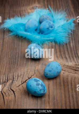 Easter eggs on rustic wooden planks Stock Photo