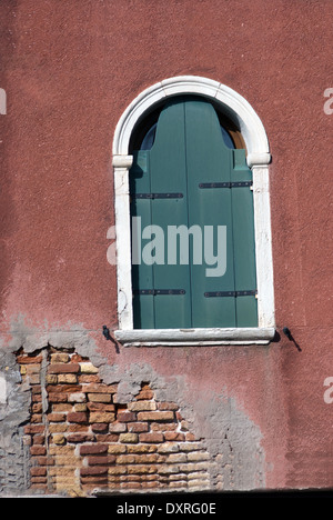 Traditional venetian vintage window close up in Venice Stock Photo