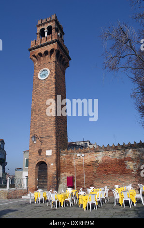 Church brick tower in island Murano in Venice Stock Photo
