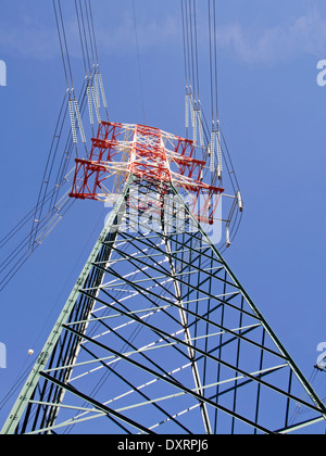 Colored high voltage pylons view from below on a sunny day in the port ...