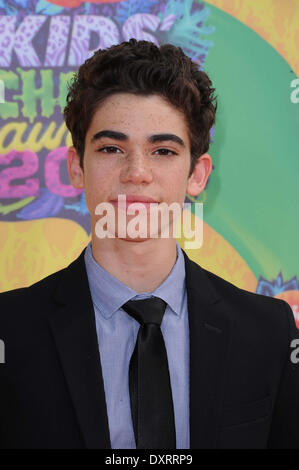 Los Angeles, CA, USA . 29th Mar, 2014. Actor Cameron Boyce arrives on the orange carpet of Nickelodeon's 27th Annual Kids' Choice Awards at USC Galen Center in Los Angeles, USA, on 29 March 2014. Photo: Hubert Boesl/dpa -NO WIRE SERVICE-/-- Credit:  dpa picture alliance/Alamy Live News