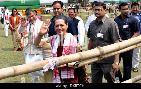Lakhimpur, India's northeastern state of Assam. 30th Mar, 2014. India's ruling Congress Party chief Sonia Gandhi (front) greets supporters during an election rally in Lakhimpur, India's northeastern state of Assam, March 30, 2014. Between April 7 and May 12, India will hold its 2014 general elections in nine phases. © Stringer/Xinhua/Alamy Live News Stock Photo