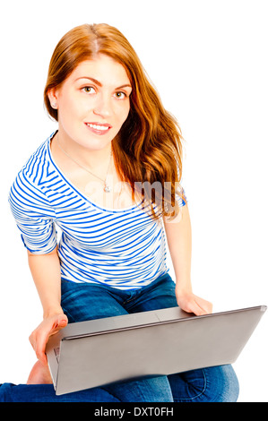 Young attractive woman working at a computer Stock Photo