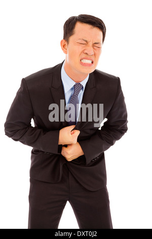 Businessman have stomach pain in studio Stock Photo