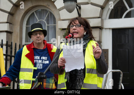 London UK. 30 March 2014. Anti-fracking campaigner Julie Wassmer speaks at the Mothers Against Fracking rally outside the Houses of Parliament. Attended by Bianca Jagger of the Bianca Jagger Human Rights Foundation and held to co-incide with Mothers Day, it was a family protest called to demonstrate the opposition of entire families to fracking in the UK. Credit:  Patricia Phillips/Alamy Live News Stock Photo