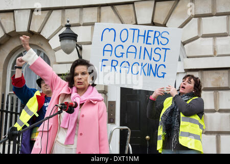 London UK. 30 March 2014. Bianca Jagger (left, wearing pink) lends her support to the Mothers Against Fracking rally at Old Palace Yard near the House of Lords in Westminster. Held to co-incide with Mothers Day, it was a family protest called to demonstrate the opposition of entire families to fracking in the UK. Credit:  Patricia Phillips/Alamy Live News Stock Photo