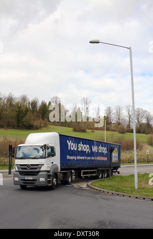 A Tesco truck entering a roundabout in Coulsdon, Surrey, England Stock Photo