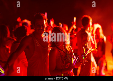 Couple dancing at music festival Stock Photo