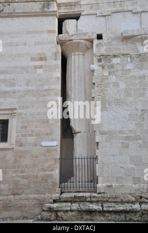 Side of the Cathedral of Syracuse, or Duomo di Siracusa, built over the  great Temple of Athena, with the original Doric columns Stock Photo