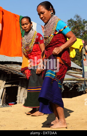 Women of the Tripura tribe dancing in their village in the Bandarban region of Bangladesh. Stock Photo