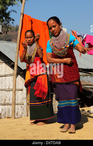 Women of the Tripura tribe dancing in their village in the Bandarban region of Bangladesh. Stock Photo