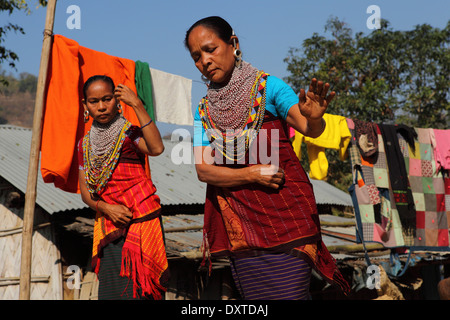 Women of the Tripura tribe dancing in their village in the Bandarban region of Bangladesh. Stock Photo