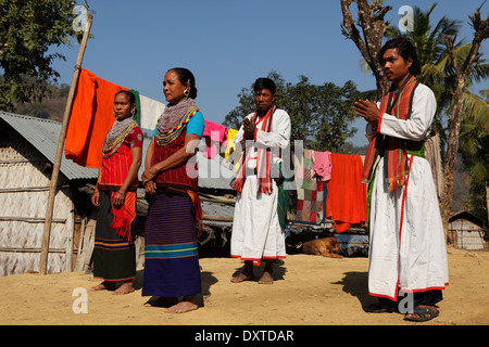 Men and women of the Tripura tribe dancing in their village in the Bandarban region of Bangladesh. Stock Photo