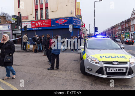 Crime near Cricklewood railway bridge: Cricklewood Lane closed to traffic after a teenager was stabbed. The 18-year-old was found in Lichfield Road with knife wounds to his leg at 5pm.  Detectives believe he was attacked in nearby Cricklewood Lane. He is in a serious but not life-threatening condition in hospital. Officers from Barnet Police are investigating. Cricklewood, London, UK on Sunday, 30 March 2014. Credit:  Cecilia Colussi/Alamy Live News Stock Photo