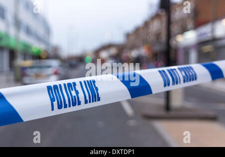 Crime near Cricklewood railway bridge: Cricklewood Lane closed to traffic after a teenager was stabbed. The 18-year-old was found in Lichfield Road with knife wounds to his leg at 5pm.  Detectives believe he was attacked in nearby Cricklewood Lane. He is in a serious but not life-threatening condition in hospital. Officers from Barnet Police are investigating. Cricklewood, London, UK on Sunday, 30 March 2014. Credit:  Cecilia Colussi/Alamy Live News Stock Photo