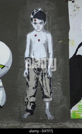 A picture by Berlin streetart artist 'Alias', a boy with bullet wounds, pictured in Berlin, June  2012. FOR EDITORIAL USE ONLY  MANDATORY CREDIT: ALIAS/PHOTO:WOLFRAM STEINBERG DPA Stock Photo