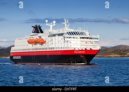 RORVIK, NORWAY - MAY 2013: Norwegian passenger cruise ship MS Polarlys enters the port of Rorvik on May 11, 2013 Stock Photo