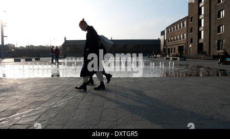 Students outside UAL University of the Arts Central St. Martins campus exterior building in Kings Cross London N1 UK   KATHY DEWITT Stock Photo