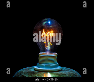 close up image of electric bulb on dark background Stock Photo