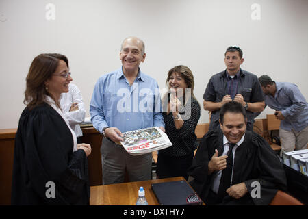 Jerusalem. 31st Mar, 2014. File photo taken on July 21, 2011, shows former Israeli Prime Minister Ehud Olmert (2nd L, Rear) and his secretary Shula Zaken (3rd L, Rear) at the District Court of Jerusalem. Former Israeli Prime Minister Ehud Olmert was convicted of taking bribery on March 31, 2014 at a Tel Aviv court in a corruption case dated back to the years when he was mayor of Jerusalem. © JINI/Emil Salman/Xinhua/Alamy Live News Stock Photo