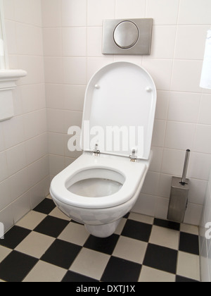 Wall mounted white ceramic toilet Stock Photo