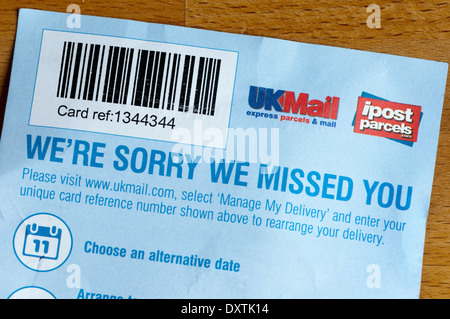 Note left by delivery company or courier unable to deliver parcel. Stock Photo