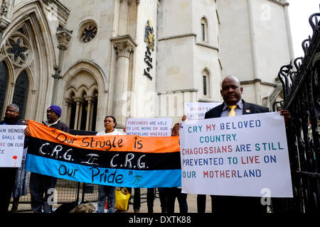 London, UK. 31st Mar, 2014. The demonstration is to mark the two day appeal against the High Court rejection of the Judicial Review of the MPA brought by Olivier Bancoult last April. The Islanders' struggle to return home has led to a decades-long legal battle in the UK courts Credit:  Rachel Megawhat/Alamy Live News Stock Photo