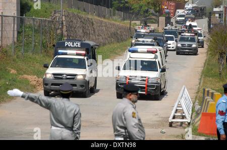 Pakistan, Islamabad. 31st Mar, 2014. A motorcade of former Pakistani military ruler Pervez Musharraf make its way to a special court hearing a treason case  him in Islamabad on March 31, 2014. Musharraf Monday appeared in the special court which charged him with high treason -- a crime that carries the death penalty or life imprisonment. Credit:  PACIFIC PRESS/Alamy Live News Stock Photo