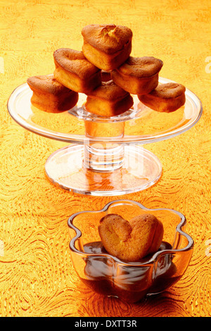 Heart-shaped apple mini cakes with chocolate sauce Stock Photo