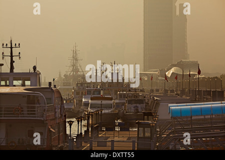 The dock for river cruises, on the Bund, along the banks of the Huangpu River, in Shanghai, China. Stock Photo