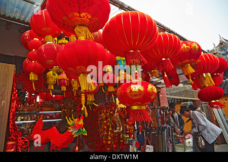 Lanterns for sale in a shop outside Chenxiangge Nunnery, near Yuyuan Garden, Shanghai, China. Stock Photo