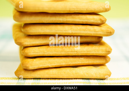 Stack of crackers on the table cloth. Stock Photo