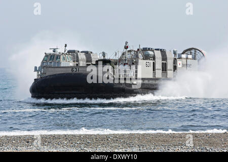 South Korean Marines Landing Craft Air Cushion prepares to land on a beach during a simulated amphibious assault part of joint training exercise Ssang Yong March 31, 2014 in Doksu-Ri, Pohang, South Korea. Stock Photo