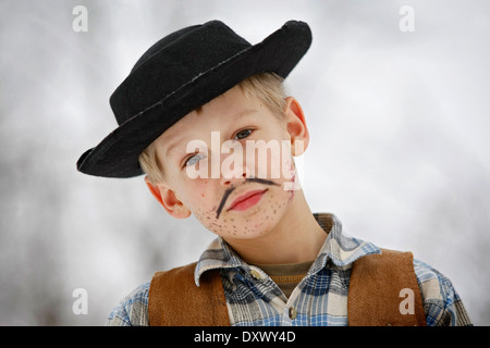 Boy dressed as a cowboy during carnival, portrait Stock Photo