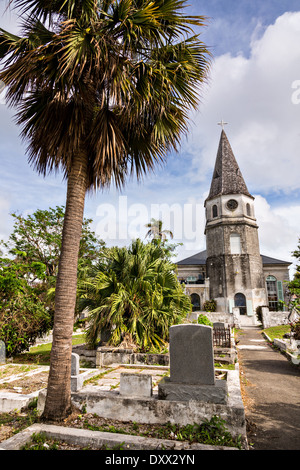 St. Matthews Anglican Church Nassau, Bahamas. St. Matthews is the oldest church in the Bahamas opened July 18th, 1802. The church's steeple along with its clock was erected in 1816 and for many years was the only reliable source of time on the Island. Stock Photo