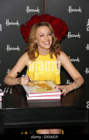 Kylie Minogue signs copies of her book Kylie/Fashion at Harrods London England - 28.11.12 Featuring: Kylie Minogue signs copies of her book Kylie/Fashion at Harrods Where: London United Kingdom When: 28 Nov 2012 Stock Photo